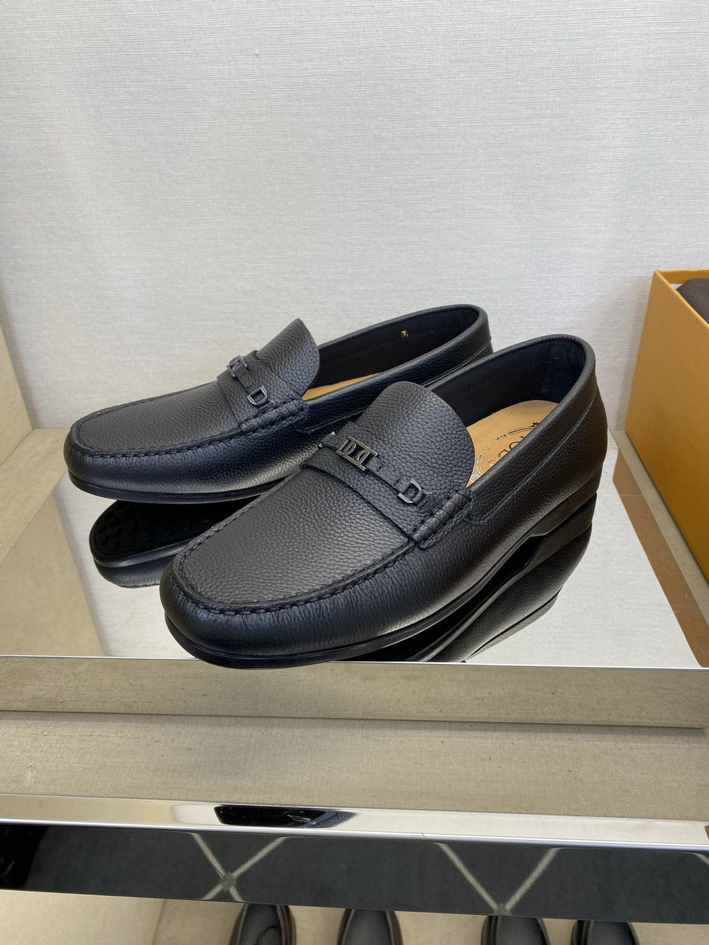 Tod's Black Leather Penny Loafers